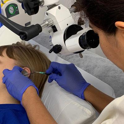 Ear wax removal by microsuction